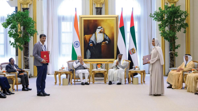 Signing of the memorandum of understanding (MoU) between UAE and Indian authorities for the establishment of an off-shore campus of the Indian Institute of Technology (IIT) in Abu Dhabi. The President of UAE, His Highness Sheikh Mohamed bin Zayed Al Nahyan, and Indian Prime Minister Narendra Modi are present during the exchange of the MoU.