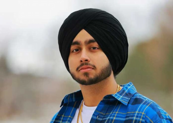 Canadian Rapper Shubh posing confidently, exuding his unique style and presence.